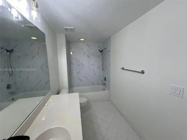 an empty room with a empty space and window