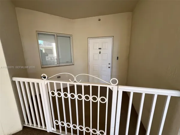 a view of a building from a balcony
