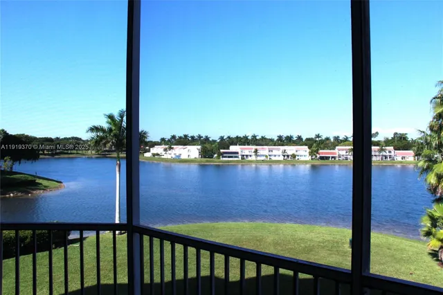 a view of a lake from a balcony