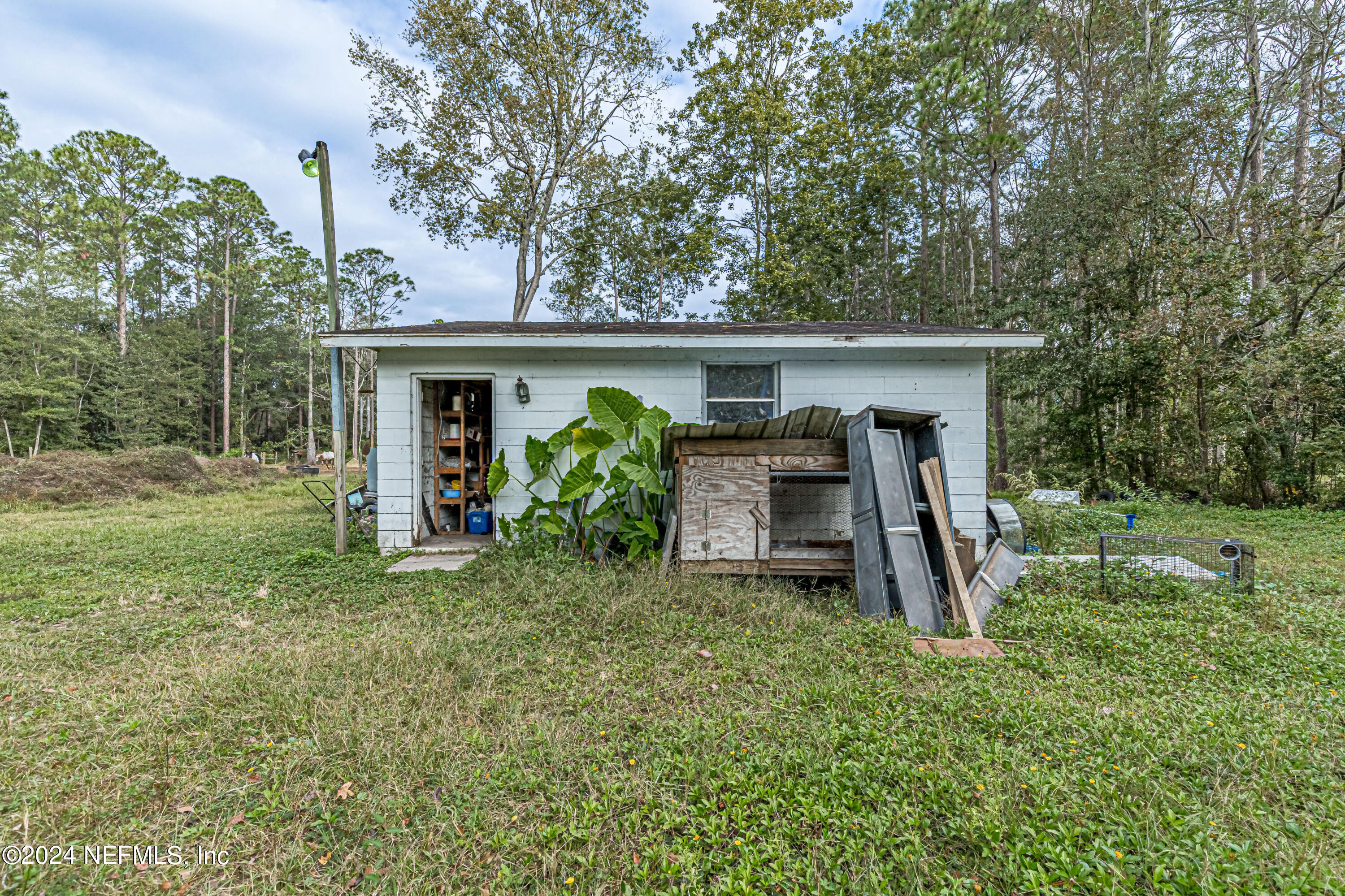 4058 Pinto Road Middleburg, FL 32068 - Photo 6 of 6 a view of front of a house with a yard