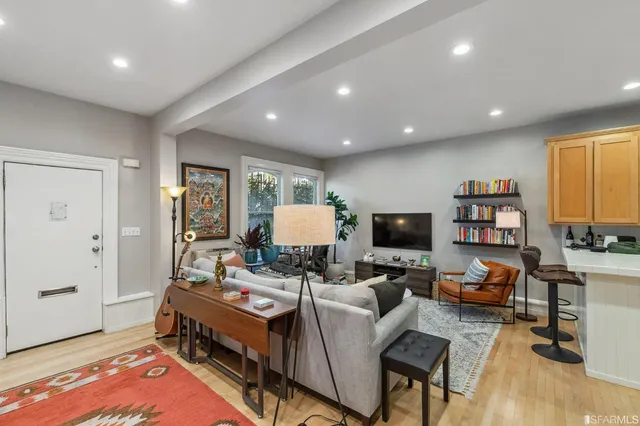 a bathroom with a double vanity sink mirror and shower