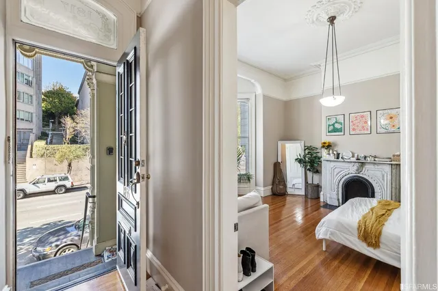 a view of a chair and table in a balcony