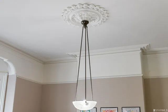 a close view of a utility room with dryer and washer