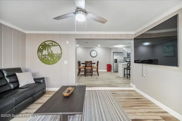 a bedroom with a large bed and a couch