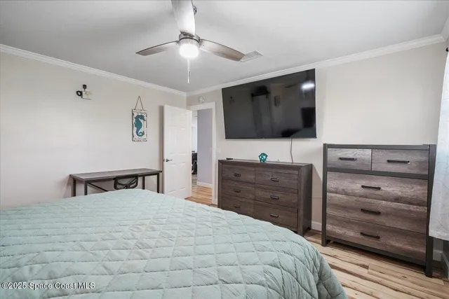 an aerial view of a house with a yard basket ball court and outdoor seating