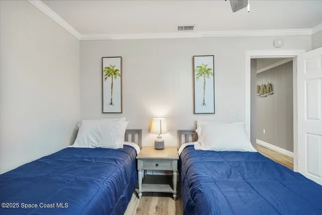 an aerial view of residential building and ocean