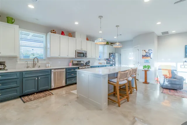 a view of a hallway with workspace