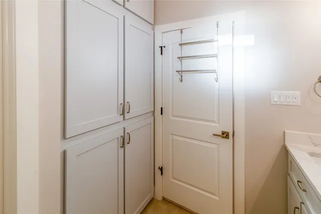 a living room with lots of furniture and a wooden floor