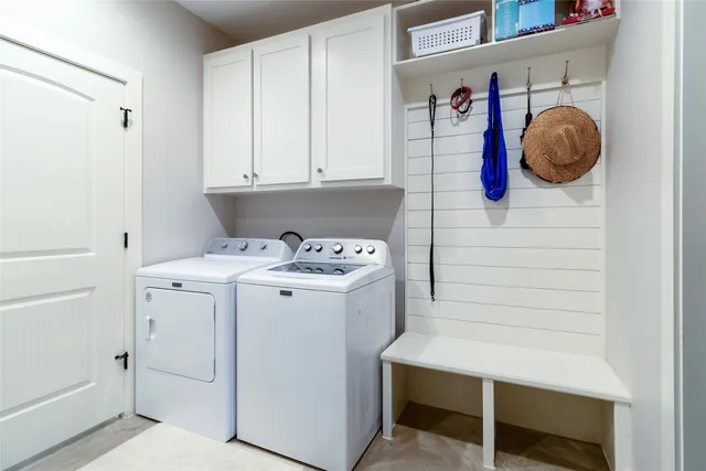 a room with lots of furniture and clutter