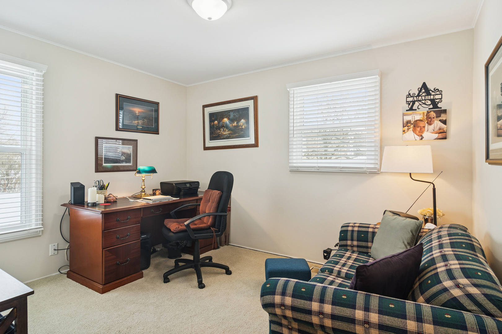 3407 Pheasant Drive Rolling Meadows, IL 60008 - Photo 10 of 16 a view of a workspace with furniture and a window