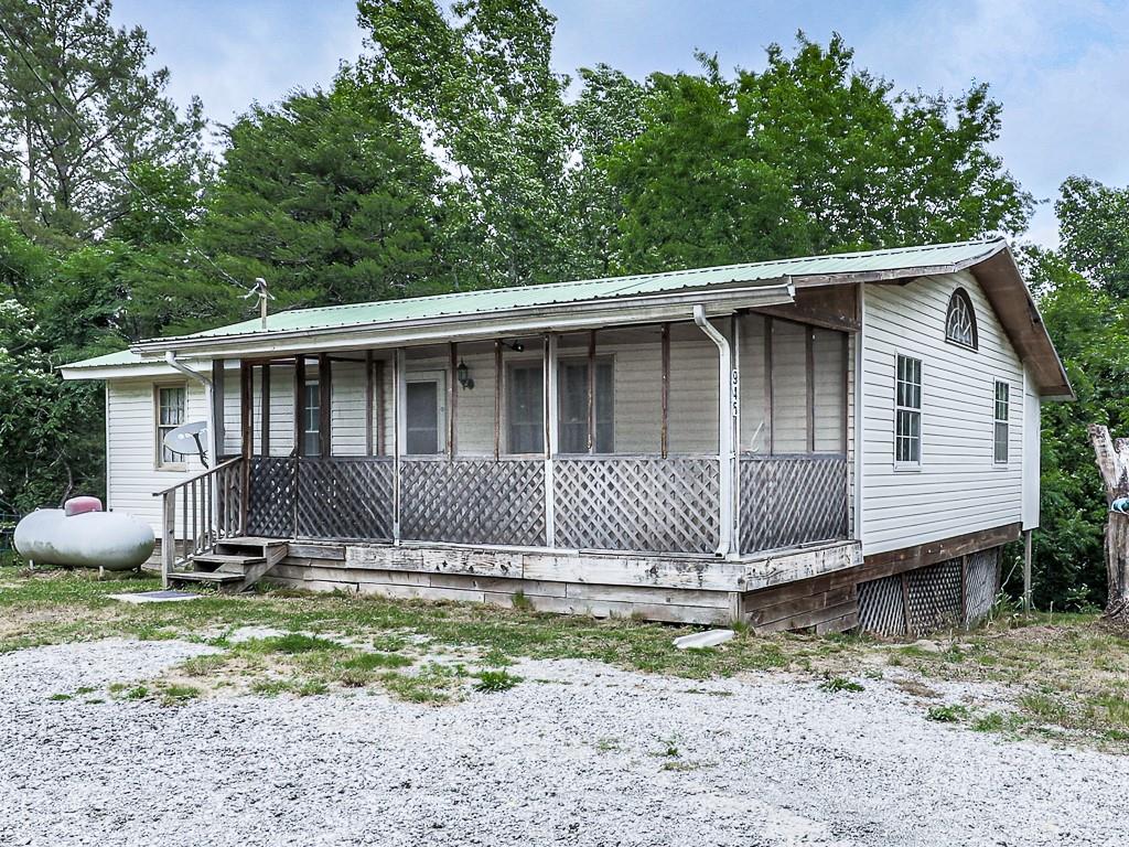945 Hightower Loop Ranger, GA 30734 - Photo 1 of 1 a front view of a house with garden
