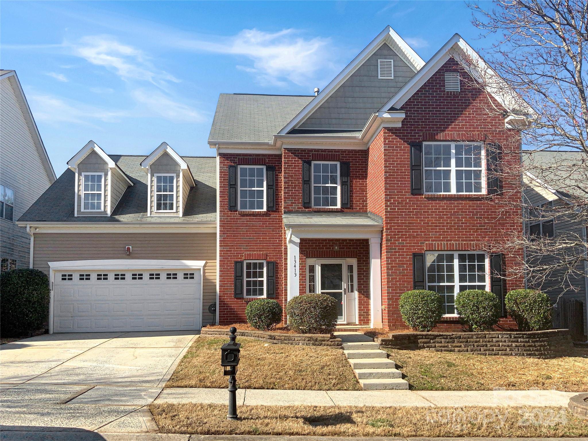 13413 Meadowmere Road Huntersville, NC 28078 - Photo 1 of 22 a front view of a house with a yard