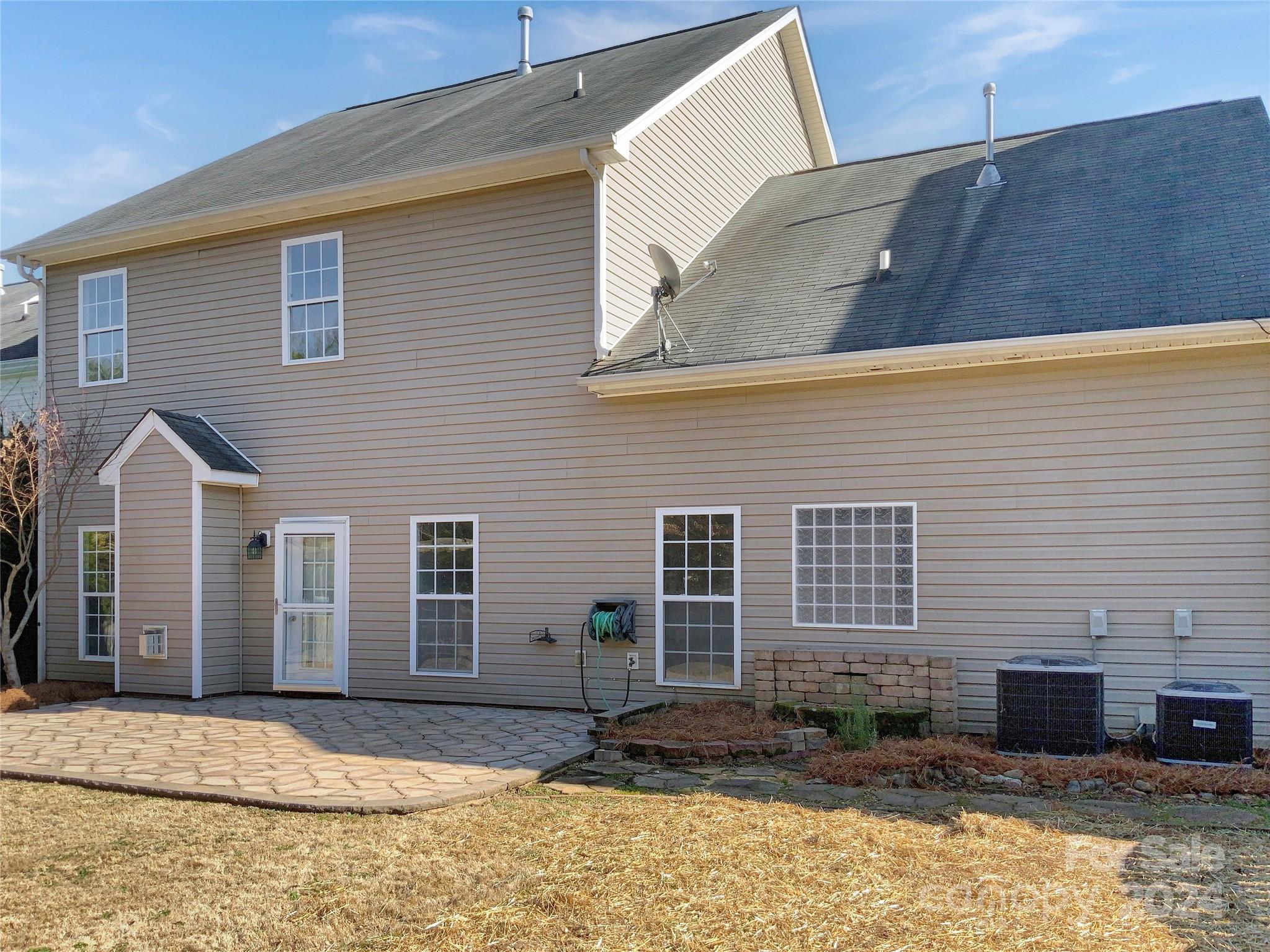 13413 Meadowmere Road Huntersville, NC 28078 - Photo 11 of 22 a backyard of a house with seating space