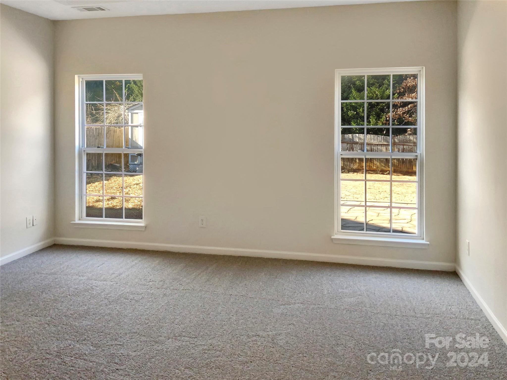 13413 Meadowmere Road Huntersville, NC 28078 - Photo 13 of 22 an empty room with a window