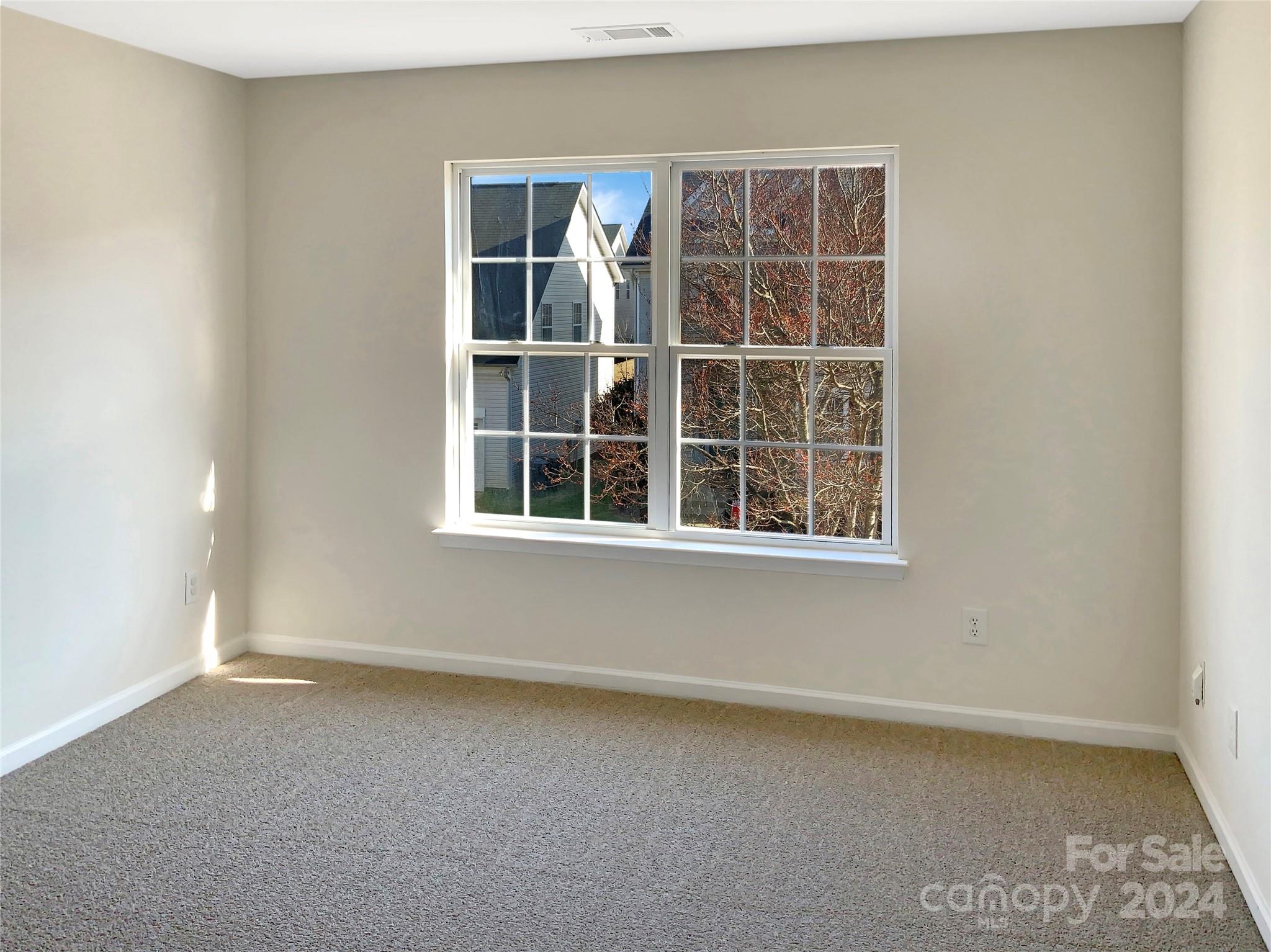 13413 Meadowmere Road Huntersville, NC 28078 - Photo 19 of 22 an empty room with a window