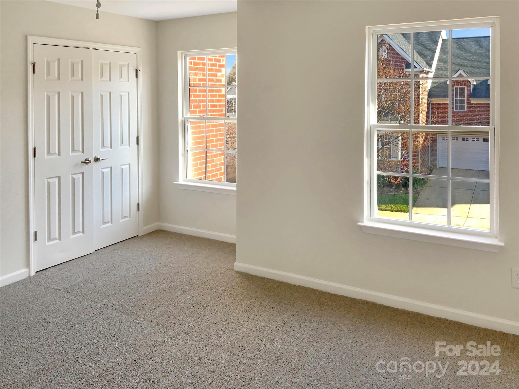 13413 Meadowmere Road Huntersville, NC 28078 - Photo 21 of 22 an empty room with windows