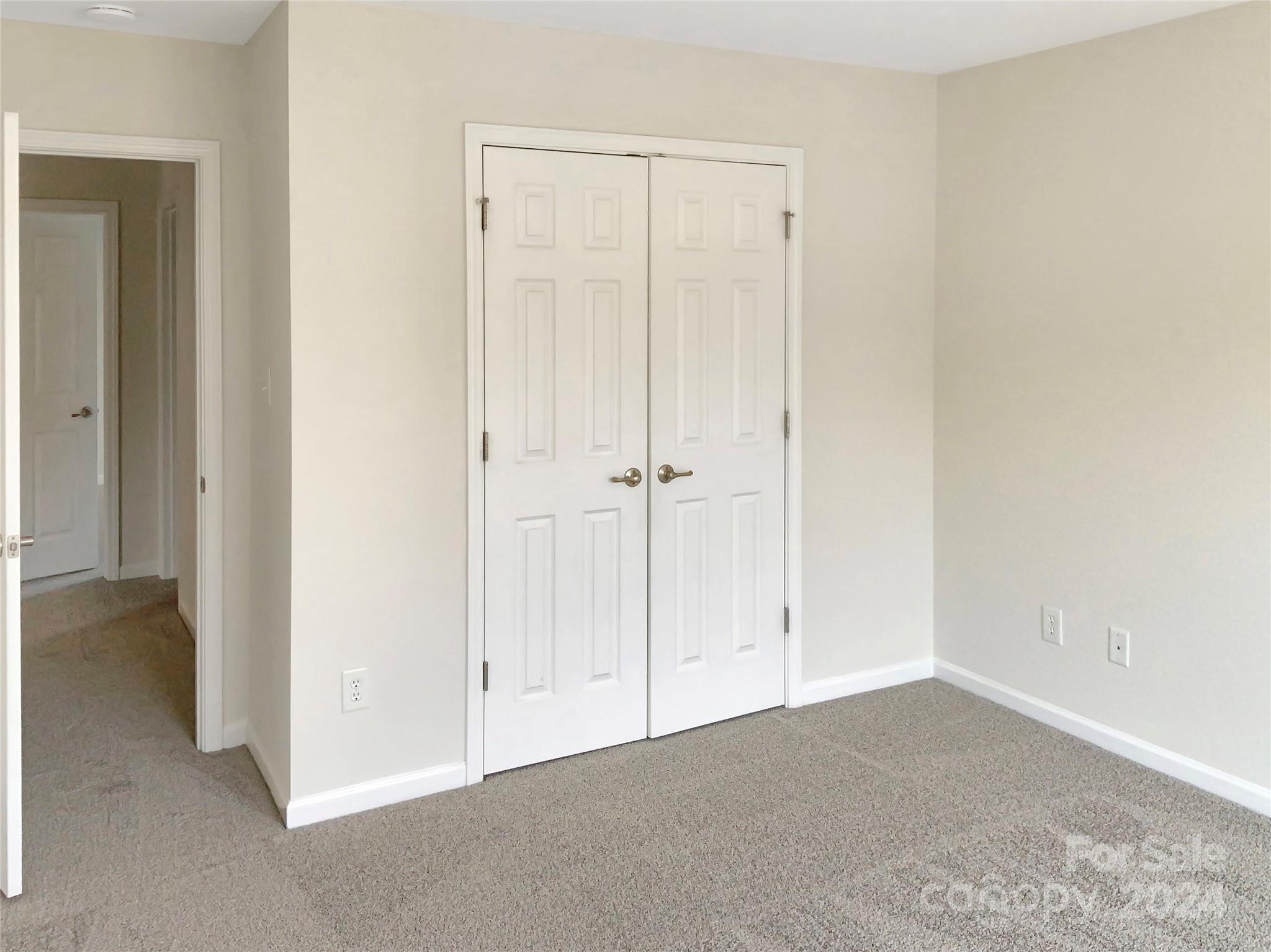 13413 Meadowmere Road Huntersville, NC 28078 - Photo 22 of 22 an empty room with closet area