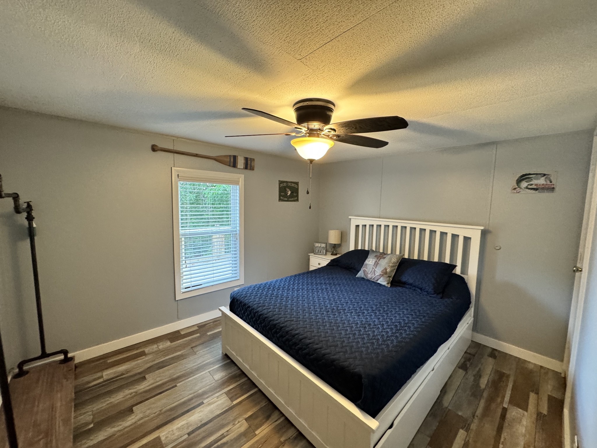 59 Riverview Lane Waverly, TN 37185 - Photo 14 of 28 a bedroom with a bed and window