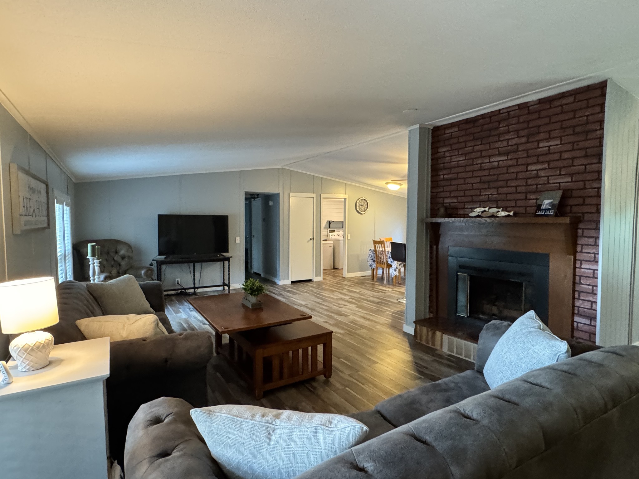 59 Riverview Lane Waverly, TN 37185 - Photo 20 of 28 a living room with furniture and a fireplace