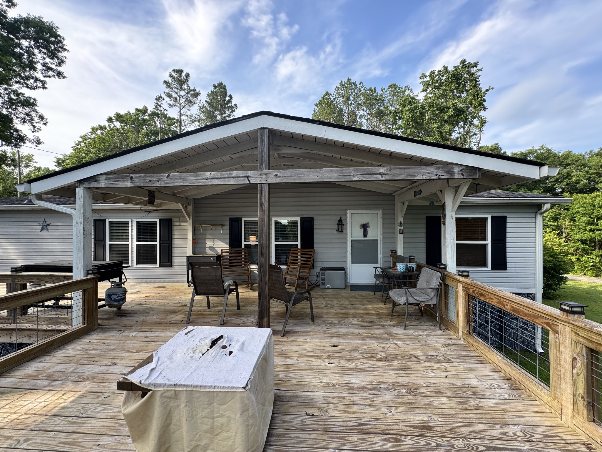 59 Riverview Lane Waverly, TN 37185 - Photo 3 of 28 a view of a house with sitting area and furniture