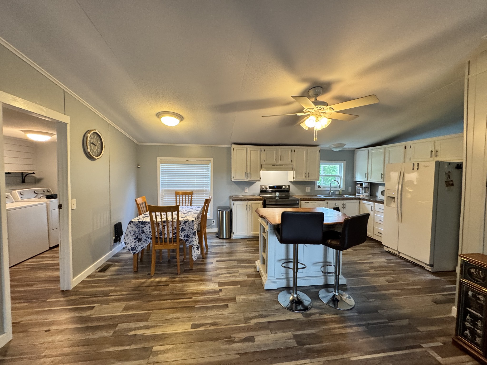 59 Riverview Lane Waverly, TN 37185 - Photo 10 of 28 a view of a dining room with furniture and a chandelier
