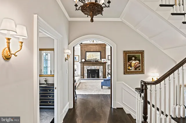 a spacious bathroom with a granite countertop sink and a mirror
