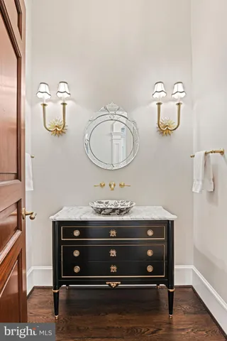 a bedroom with a bed and a fireplace