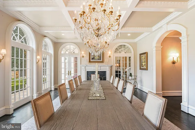 a bathroom with a granite countertop toilet sink and a mirror