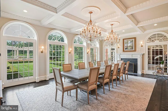 a spacious bedroom with a bed and a fireplace