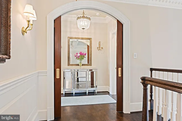 an aerial view of residential house with outdoor space and parking