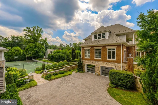 a view of living room and entryway with wooden floor