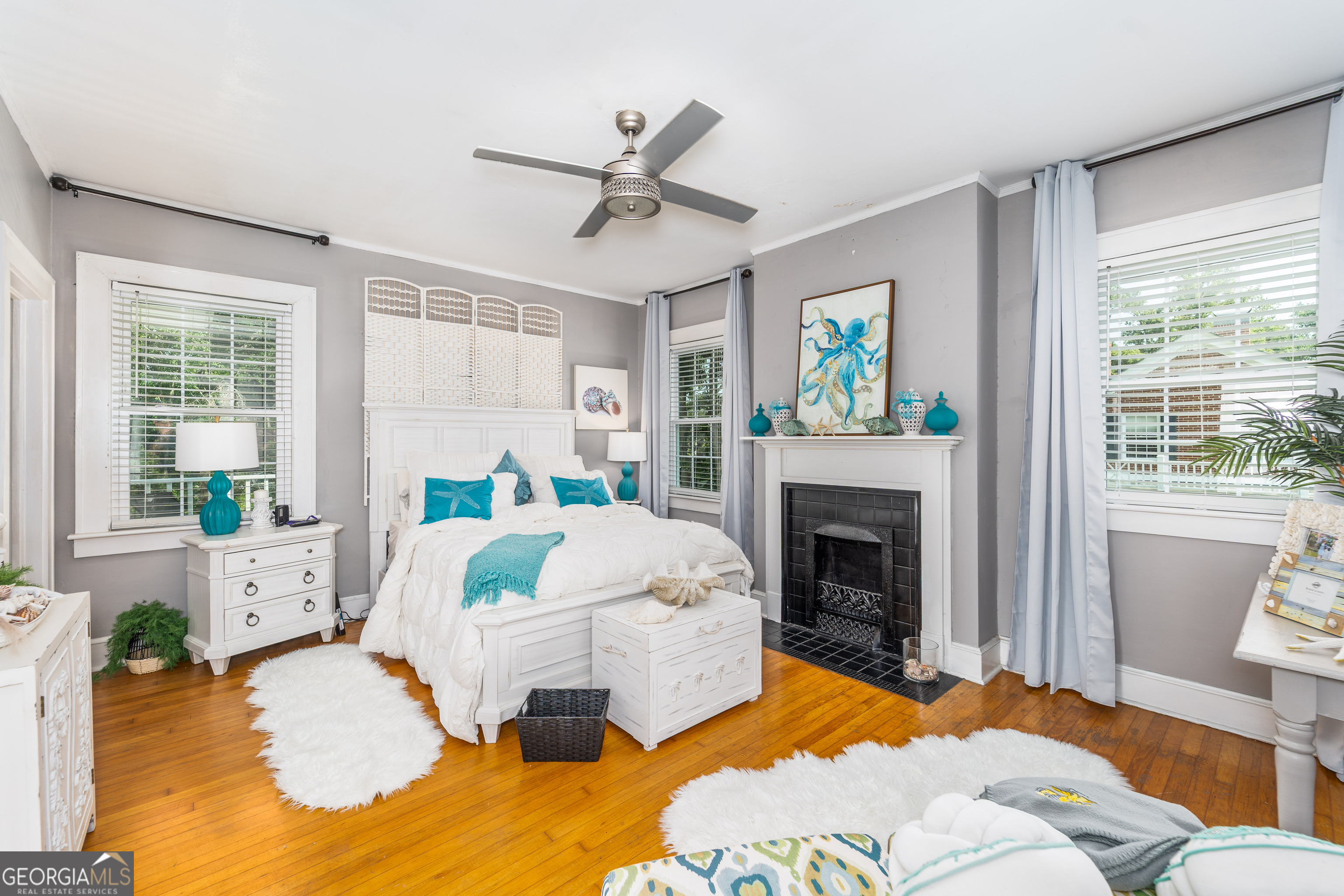 1101 Cherokee Drive Waycross, GA 31501 - Photo 19 of 24 a living room with furniture fireplace and a large window