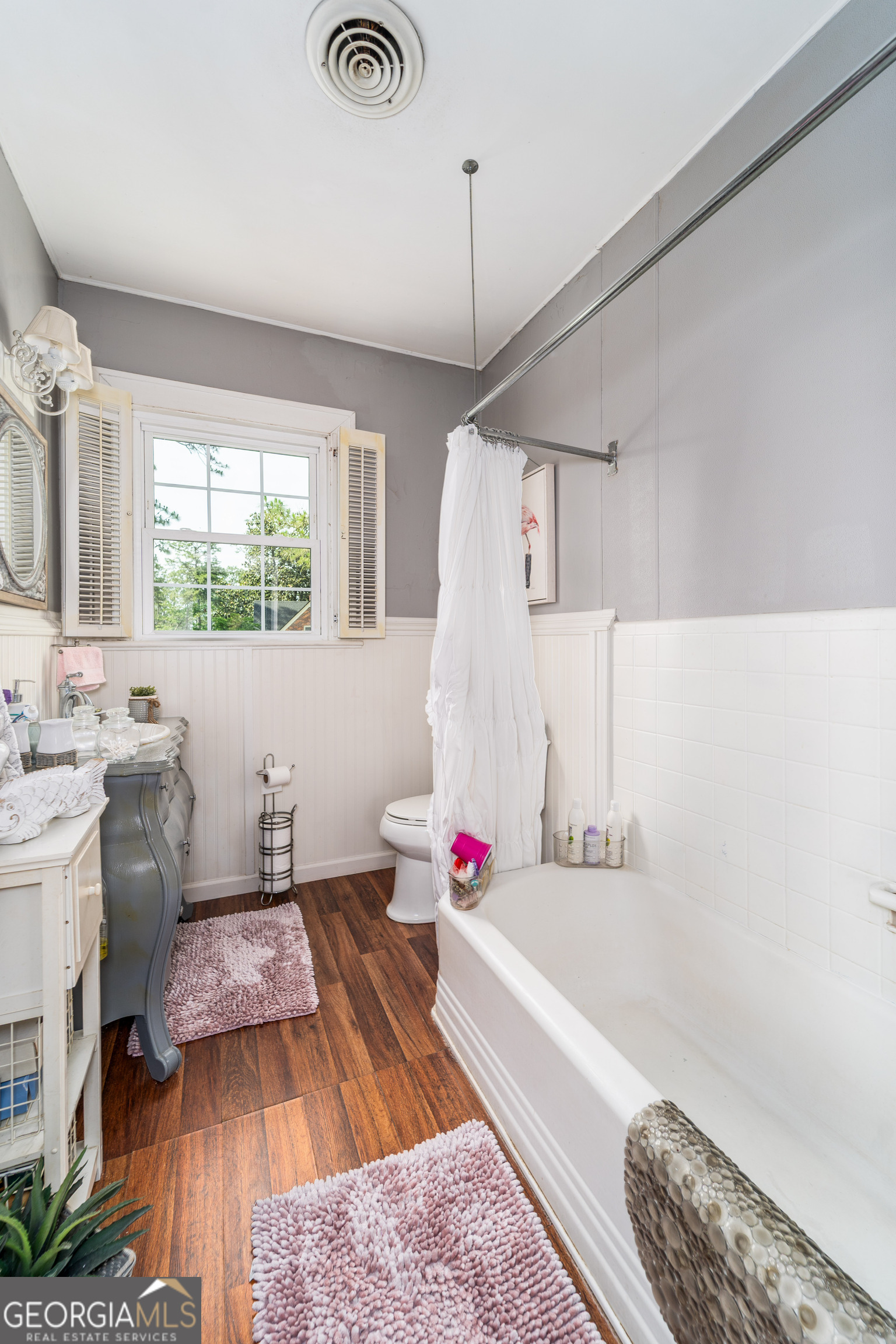 1101 Cherokee Drive Waycross, GA 31501 - Photo 24 of 24 a bathroom with a tub sink and a toilet