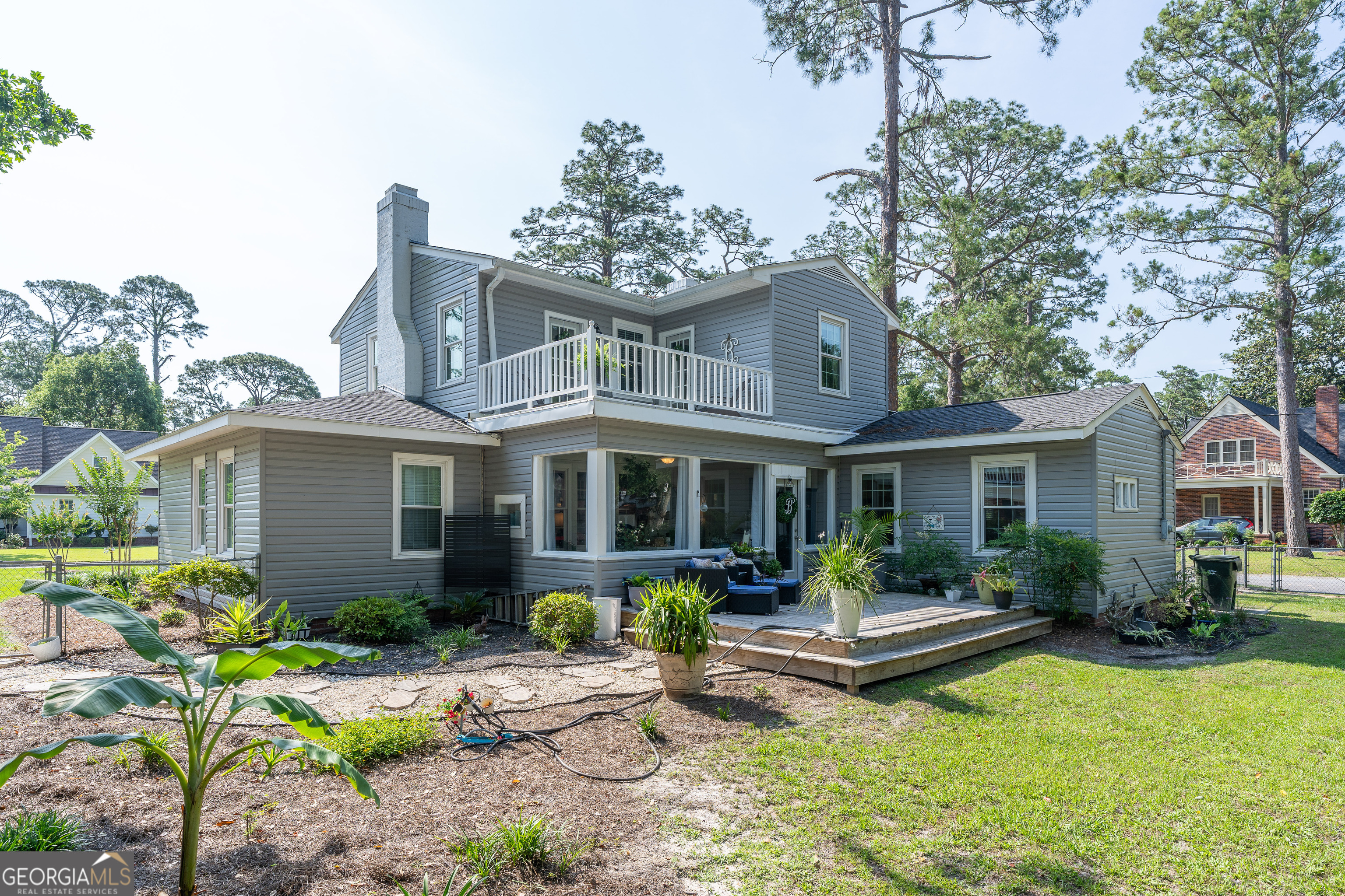 1101 Cherokee Drive Waycross, GA 31501 - Photo 6 of 24 a front view of a house with swimming pool and furniture