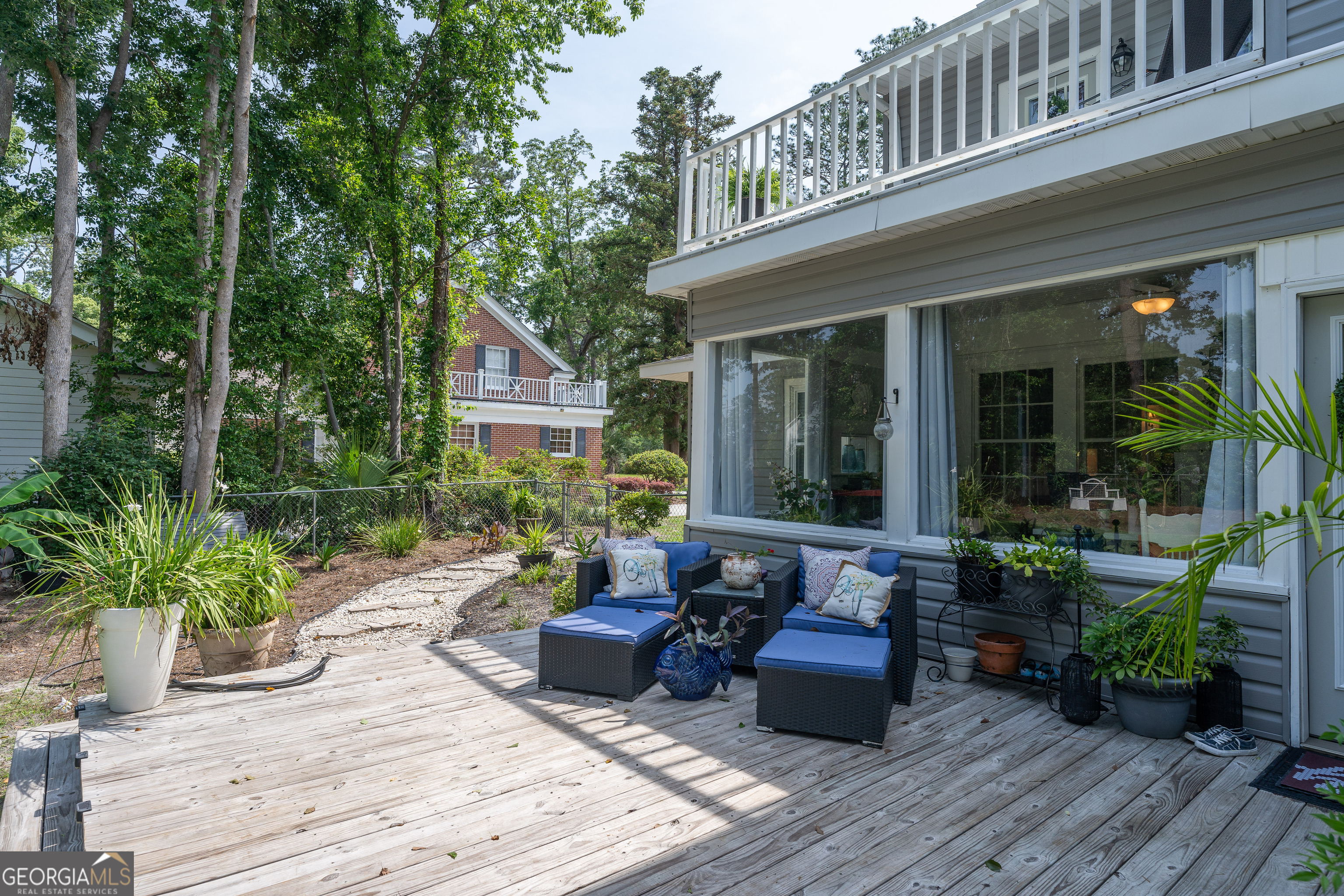 1101 Cherokee Drive Waycross, GA 31501 - Photo 9 of 24 a view of a house with sitting area and furniture
