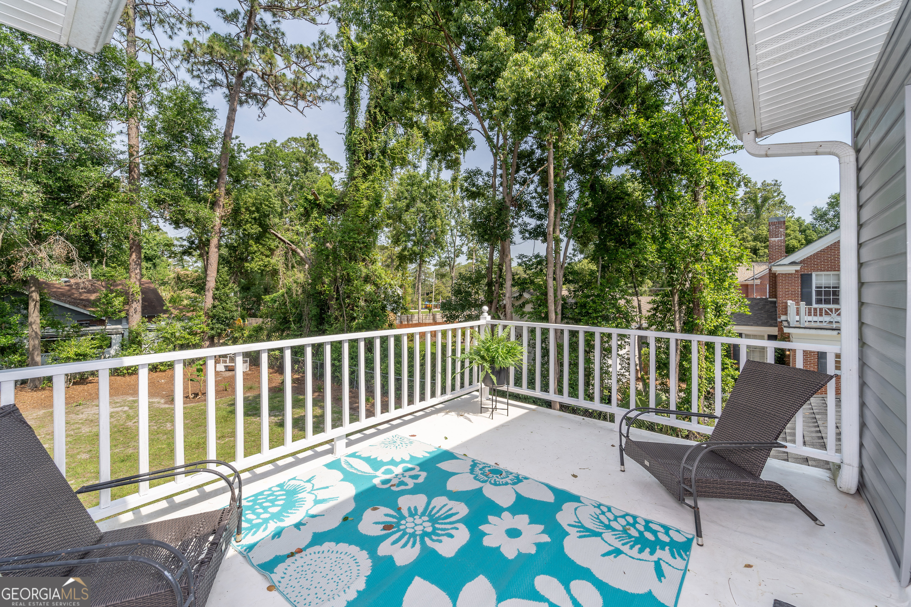 1101 Cherokee Drive Waycross, GA 31501 - Photo 10 of 24 a balcony with wooden floor and outdoor space