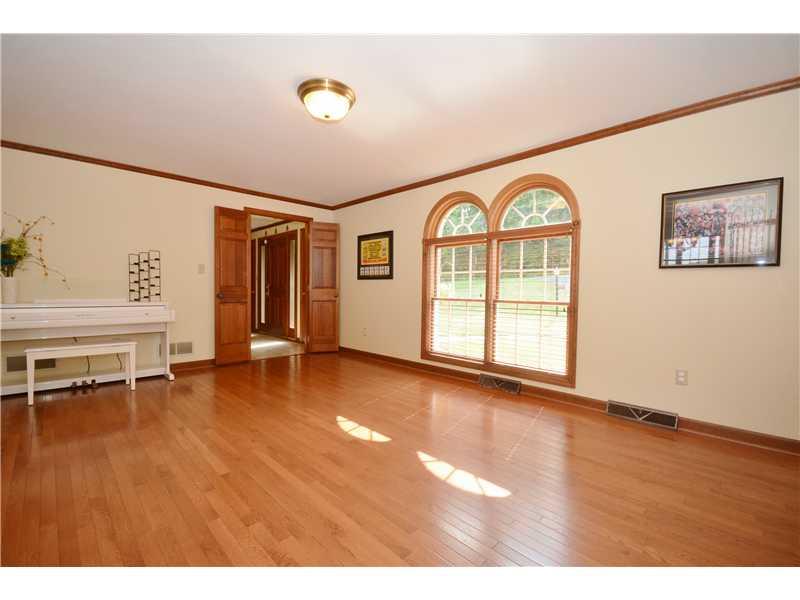 132 Froebe Road Venetia, PA 15367 - Photo 11 of 25 Living Room. Double arched windows make a statement in the living room with the hardwood floors. The entrance to the living room can be closed off with the double doors, if desired.