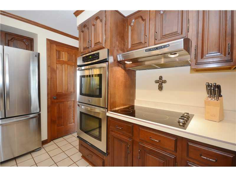 132 Froebe Road Venetia, PA 15367 - Photo 5 of 25 Kitchen. You will enjoy the ease of cooking with this electric cook top located near the island. Well lit sleek vent located above.