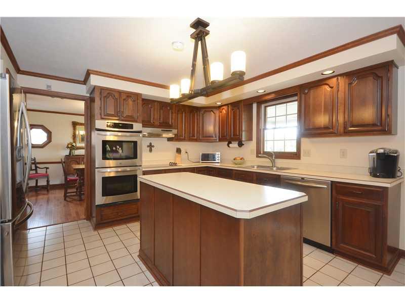 132 Froebe Road Venetia, PA 15367 - Photo 7 of 25 Kitchen. Another view of the kitchen shows you how many cabinets and counter top space you have for work space. Kitchen has wonderful view of countryside.