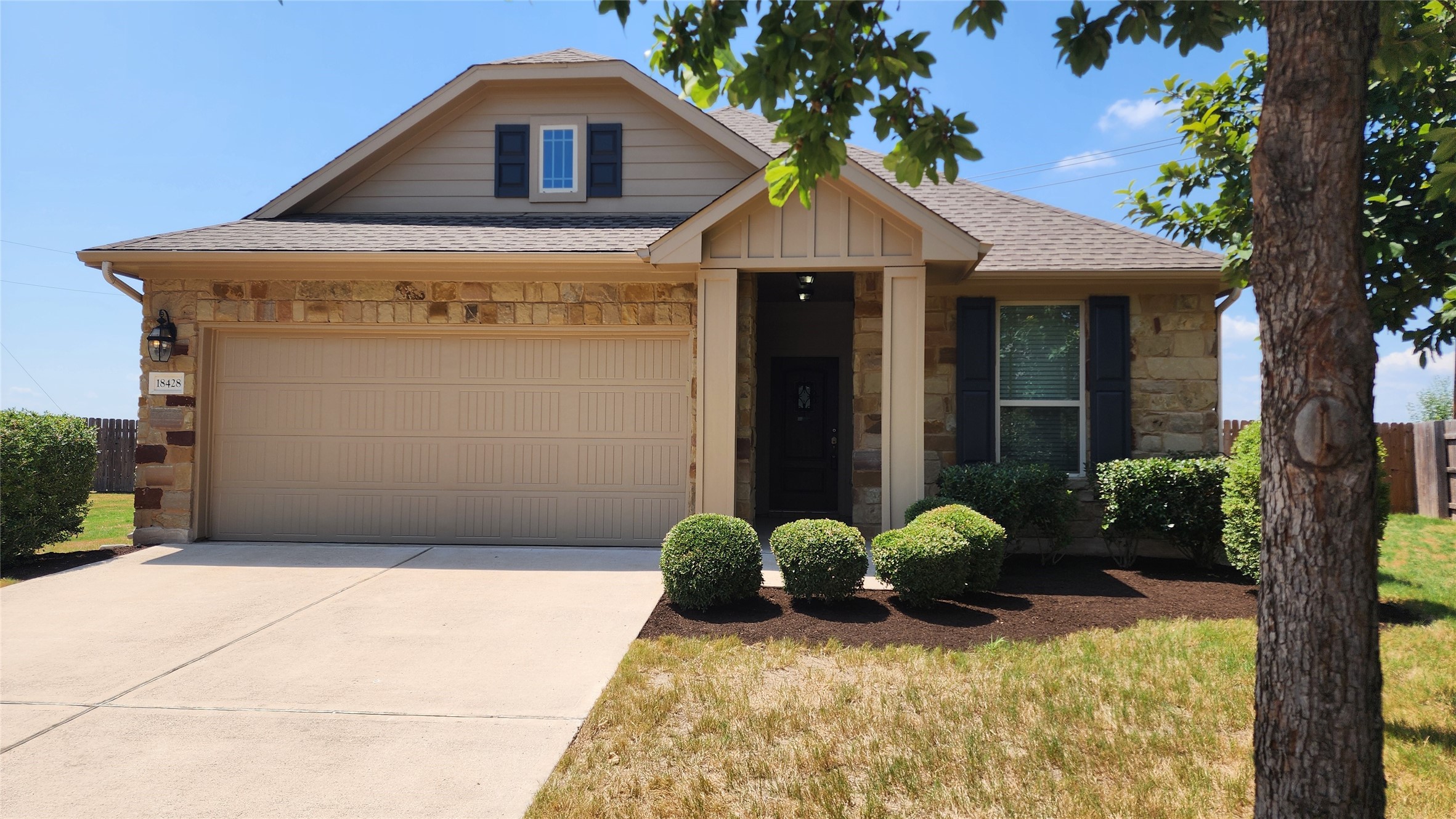 Really nice stone and brick exterior and fresh exterior paint and recent roof. The landscaping is pretty and easily maintained.