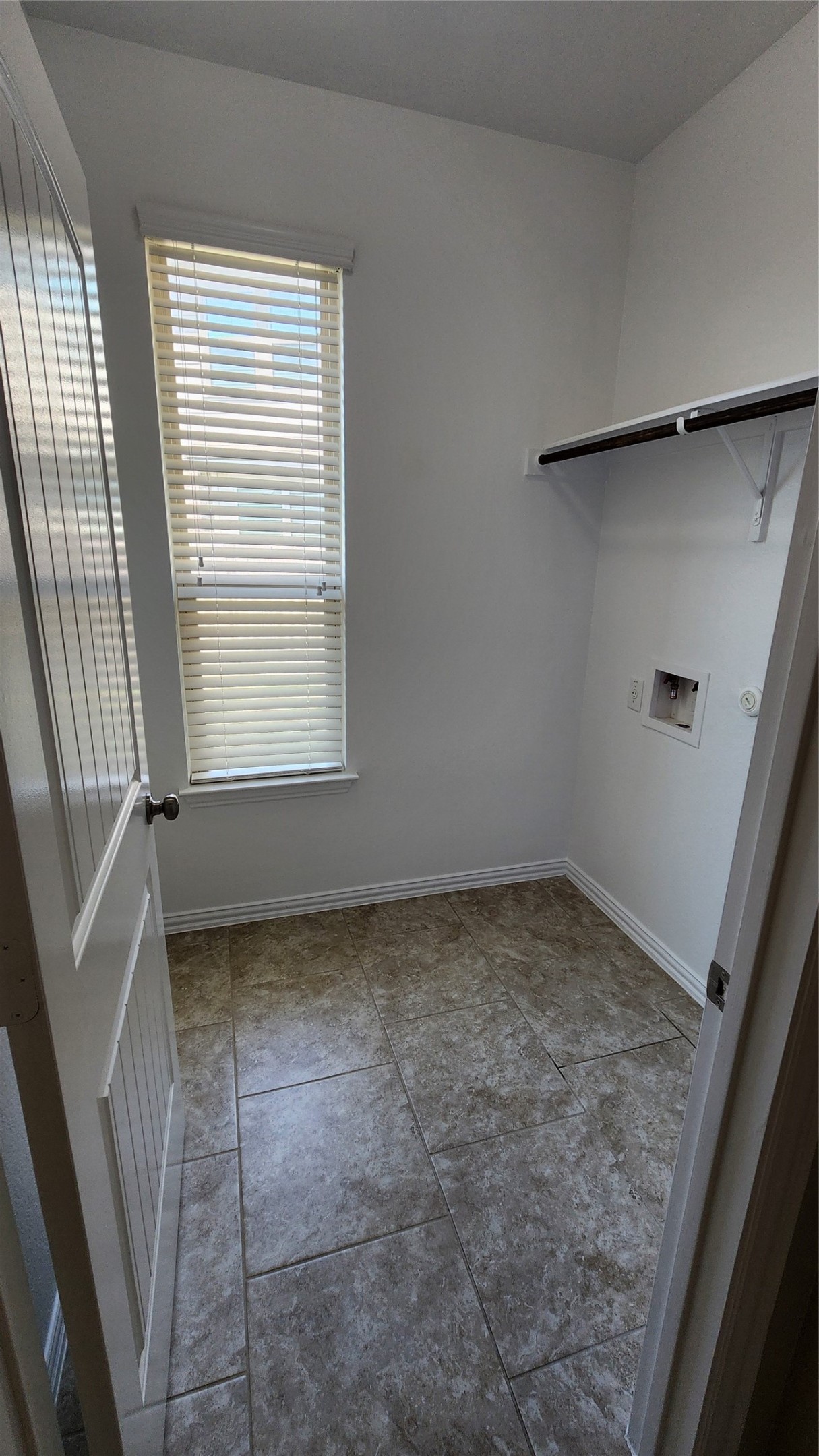 18428 Blush Rose Road Pflugerville, TX 78660 - Photo 7 of 32 Laundry Room. Fresh paint