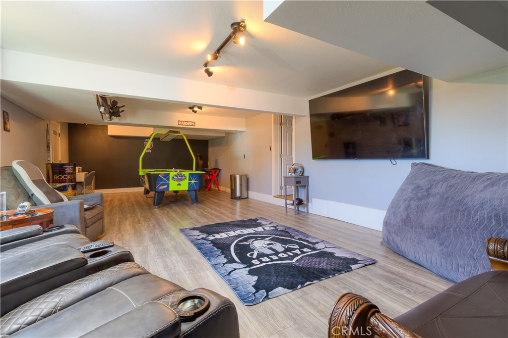 3929 Pardes Way Paradise, CA 95969 - Photo 40 of 73 a living room with furniture and a flat screen tv