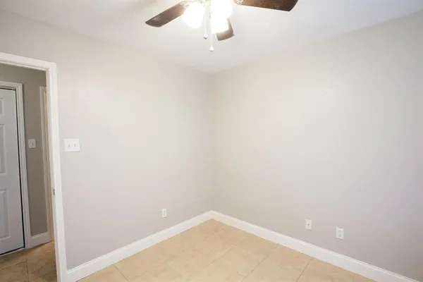 a view of a small space with racks on the wall