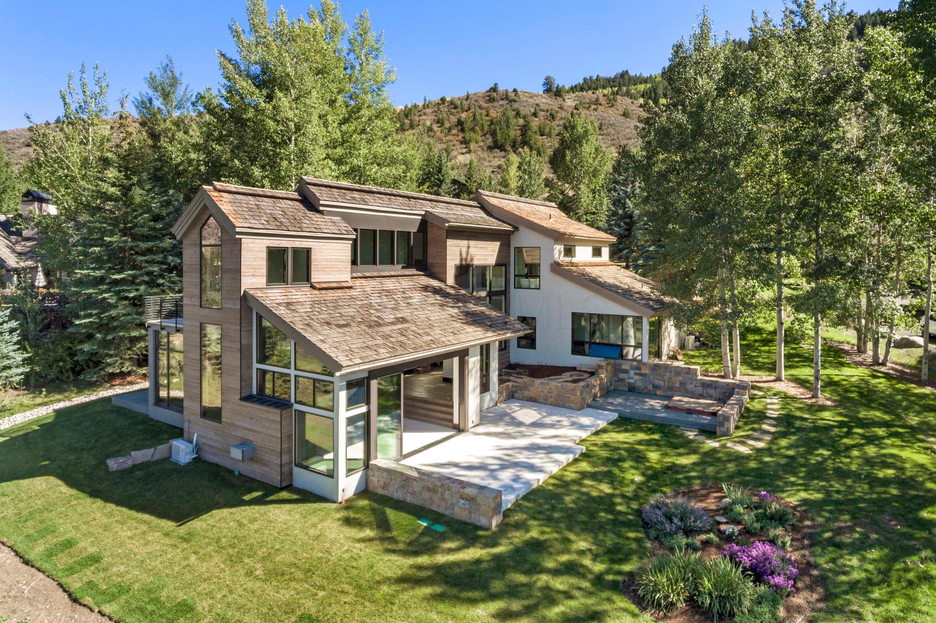 144 Castle Peak Gate Edwards, CO 81632 - Photo 2 of 46 front view of a house with a yard