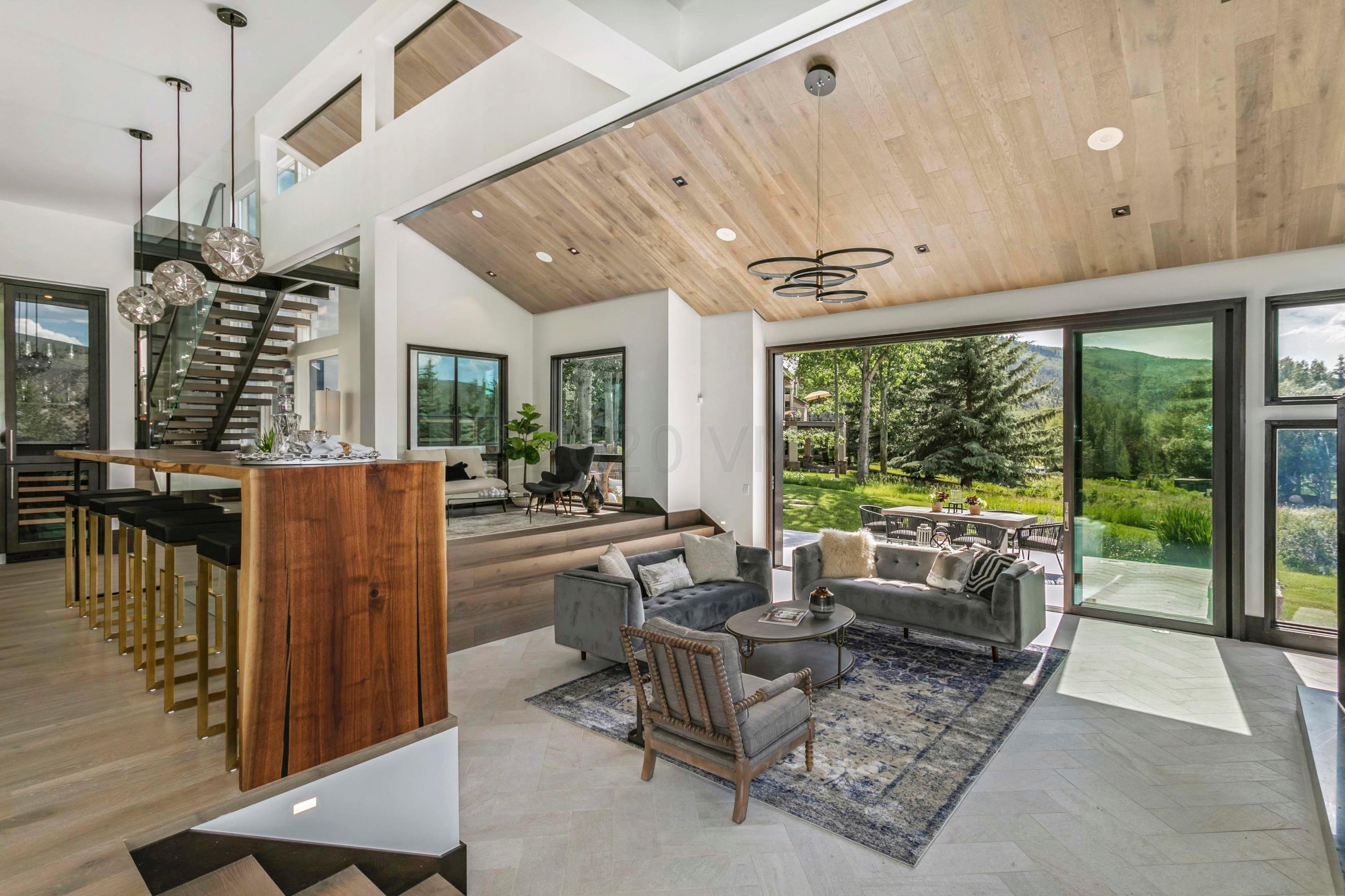 144 Castle Peak Gate Edwards, CO 81632 - Photo 6 of 46 a view of a dining room with furniture window and outside view