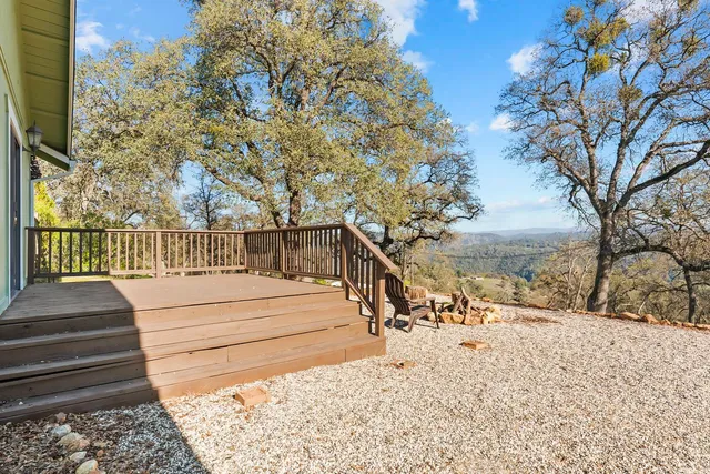 a view of stairs and with trees in the background