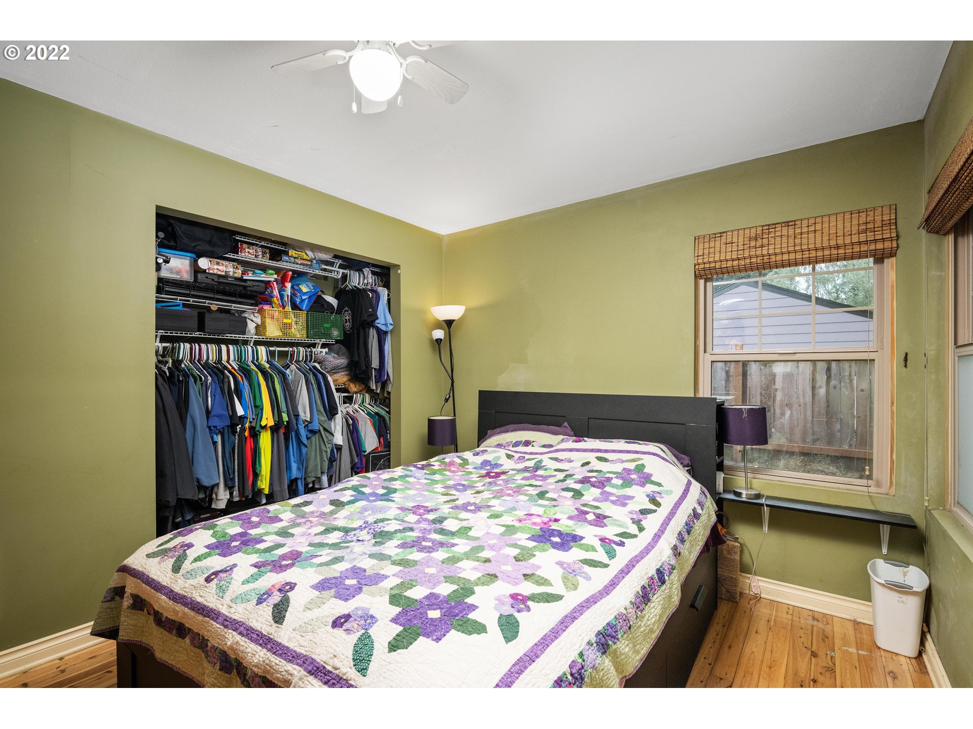 12855 Southwest Douglas Street Portland, OR 97225 - Photo 15 of 32 a bed sitting in a bedroom next to a window