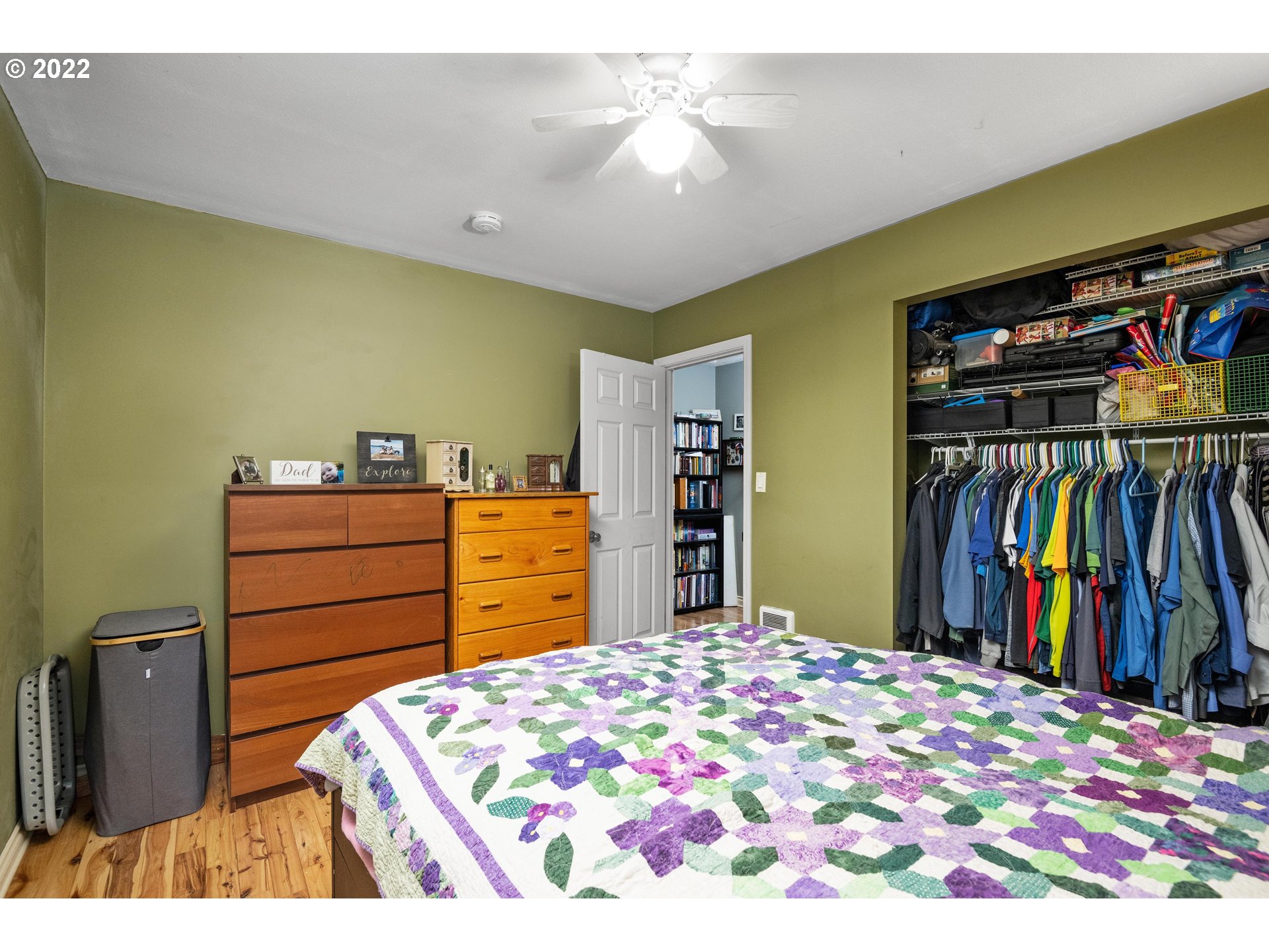 12855 Southwest Douglas Street Portland, OR 97225 - Photo 16 of 32 a bedroom with a bed and a closet