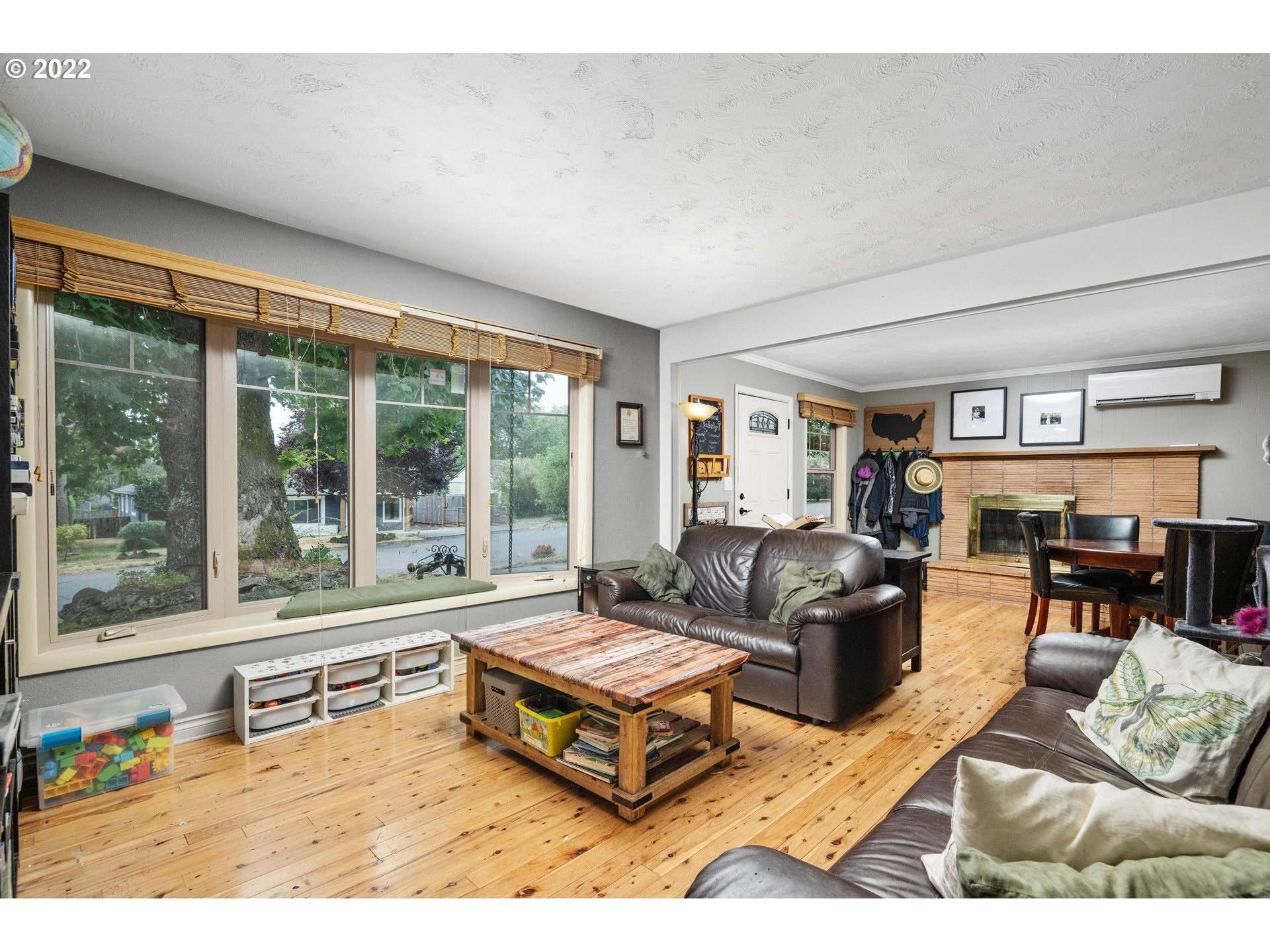 12855 Southwest Douglas Street Portland, OR 97225 - Photo 4 of 32 a living room with furniture and a large window