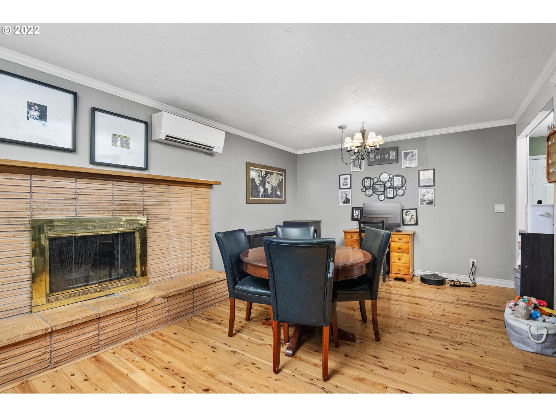 12855 Southwest Douglas Street Portland, OR 97225 - Photo 6 of 32 a view of a dining room with furniture and wooden floor